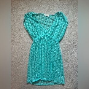 Turquoise bathing suit cover up, only worn a couple of times.